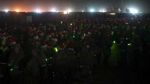 Soldiers wearing Santa hats