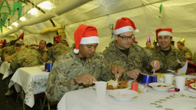 Troops tuck into their Christmas dinner