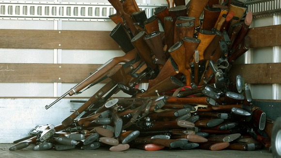 Weapons, including assault rifles, were collected at the event.