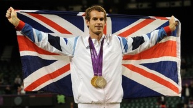 Andy Murray celebrates his Olympic medals