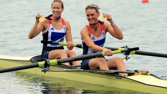 Helen Glover and Heather Stanning celebrate becoming winning Britain's first gold in women's rowing.