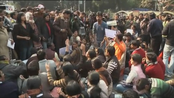 The demonstrators chanted and held signs calling for justice