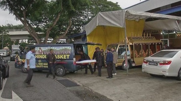 The body of the Indian gang-rape victim is taken to a funeral parlour for embalming