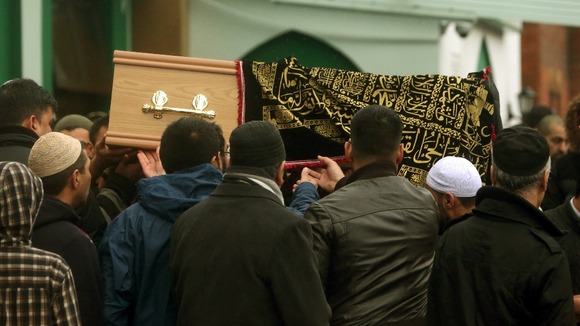 Mourners gather at the funeral of two brother killed in a crash on the M6