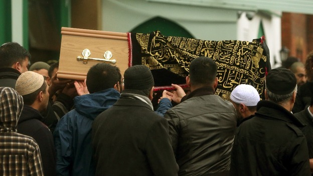 Mourners gather at the funeral of two brother killed in a crash on the M6