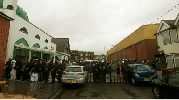 Mourners at the funeral of two brother killed in a crash on the M6