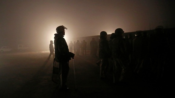 The cremation took place under a dense cloud of fog
