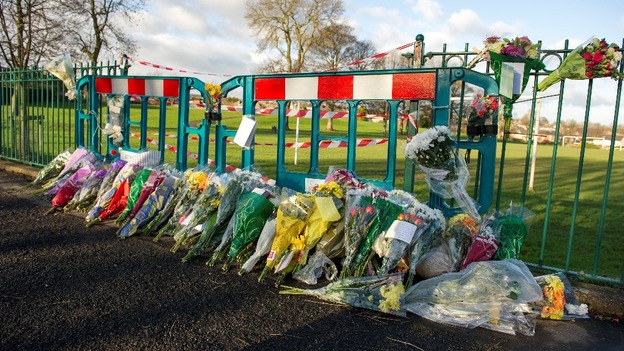 Flowers were left at the spot where in Sheffield where Alan Greaves was attacked
