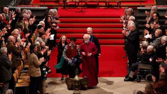 The Archbishop of Canterbury Dr. Rowan Williams accompanied by family members, leaves Canterbury Cathedral in Kent.