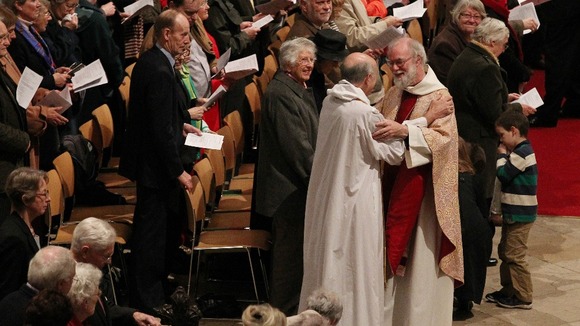 The Archbishop of Canterbury Dr. Rowan Williams 62, greets members of the congregation.