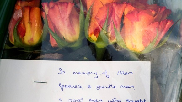 Flowers left at the scene near St Saviour in High Green, Sheffield.