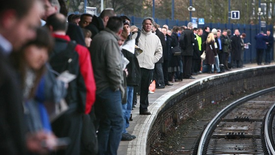 File photo of commuters on a platform as rail fares get set for another above inflation rise