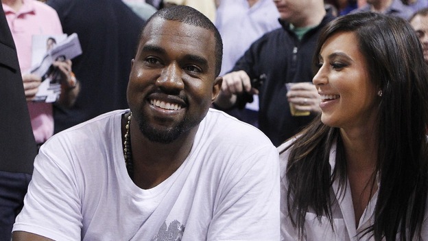 Rap musician West and Kardashian watch basketball in Miami on December 6