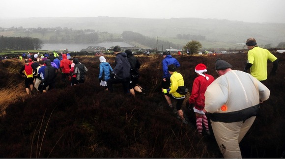 Fancy dress runners make their way across Bronte Country in the Auld Lang Syne Fell Race