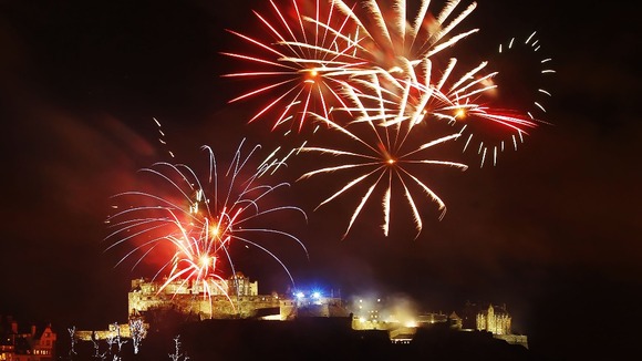 Fireworks go off over Edinburgh Castle as part of the new year 2013 Hogmanay celebrations