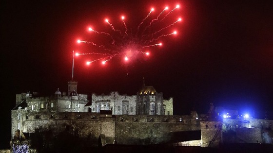 Edinburgh Castle is topped with a ring of fireworks as part of Hogmanay festivities