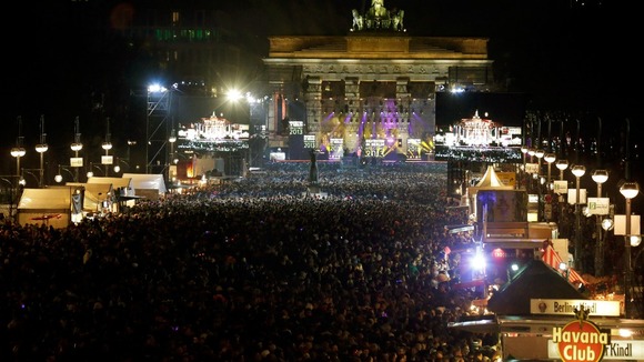 crowds gather at brandenburg gate for new year in berlin crowds gather at brandenburg gate for new year in berlin