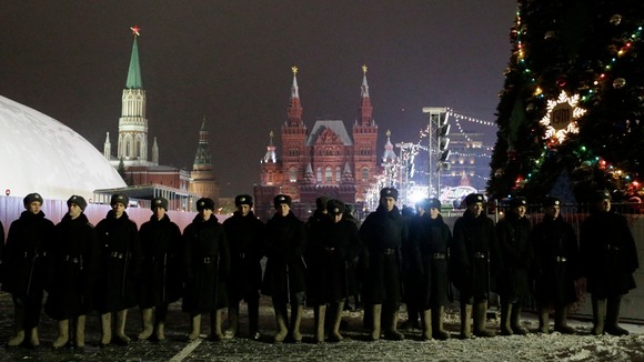Russian interior ministry soldiers stand in line ahead of New Year's Day in Red Square in Moscow