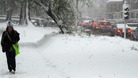 A paper boy makes his way through snow in the Crosspool area of Sheffield