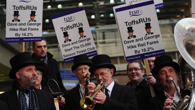 Rail campaigners from the transport union TSSA demonstrate outside St Pancras station