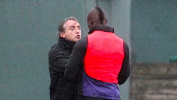 The striker had to be separated from Blues boss Roberto Mancini, who reacted after Balotelli caught Scott Sinclair with a late challenge