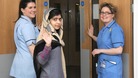 Malala Yousufzai waves goodbye to hospital staff in Birmingham