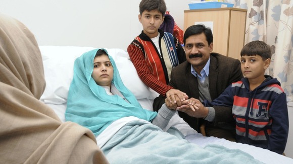 Malala Yousufzai with her father Ziauddin and her two younger brothers Khushal Khan and Atal Khanbefore in October