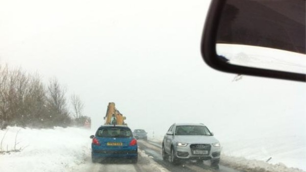 Traffic on snow-covered road