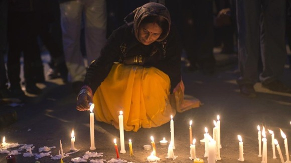 Candle lit vigil is held in India for the 23-year-old student who died after she was attacked in Delhi