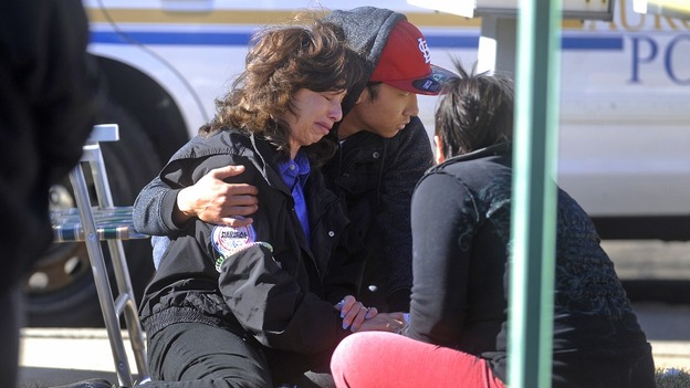 An unidentified woman is in tears following news of the hostage stand-off.
