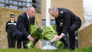 Temp Chief Constable Tim Madgwick and Mike Stubbs from the North Yorkshire Police Federation lay flowers outside Harrogate Police Station
