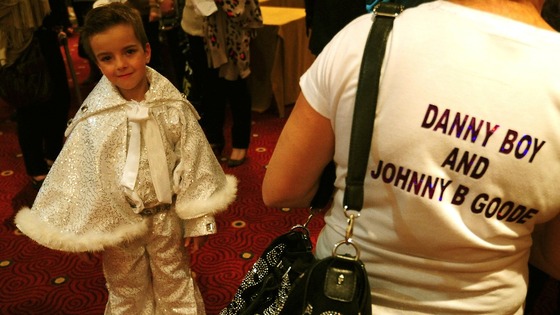 John Paul Melling,6, alias Johnny B Goode from Billinge, waits to perform during the under-14 European Elvis Championships in Birmingham.