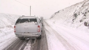 Cars on snowy road