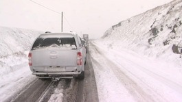 Cars on snowy road