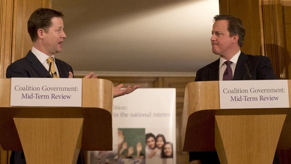 Deputy Prime Minister Nick Clegg and Prime Minister David Cameron at a Downing Street press conference to launch their Mid-Term Review
