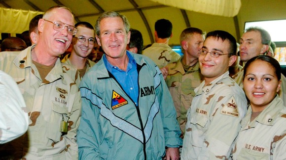 Former US President George W. Bush visits troops stationed in Iraq in 2003