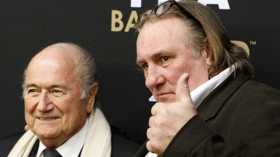 Gerard Depardieu arrives with Sepp Blatter at the Ballon d'Or gala on Monday