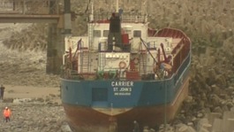 Ship grounded on rocks near Llanddulas