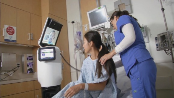 A doctor using the iRobot’s RP-VITA system to consult with a patient