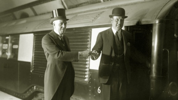 Lord Ashfield hands over a train key at the opening of the Northern line in 1926