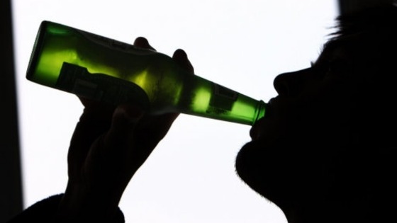 Person drinking beer
