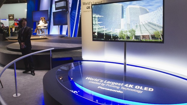 A 56-inch, 4K OLED television set is displayed at the Panasonic booth during the first day of the CES in Las Vegas