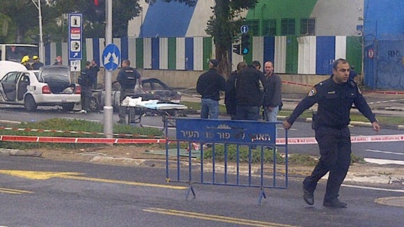 Police and rescue workers a the scene after the explosion