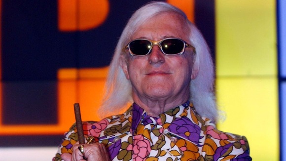 Jimmy Savile seen during a photocall at Top of the Pops at Television Centre