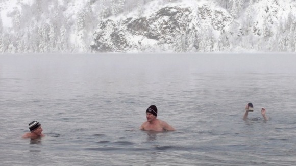 Members of the local winter swimming club take part in the weekly bathing session in Divnogorsk, Russia.