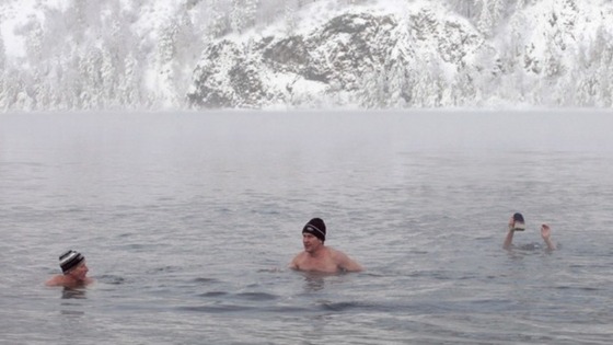 Members of the local winter swimming club take part in the weekly bathing session in Divnogorsk, Russia.