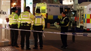 Police cordon of the area where the men where stabbed in Birmingham