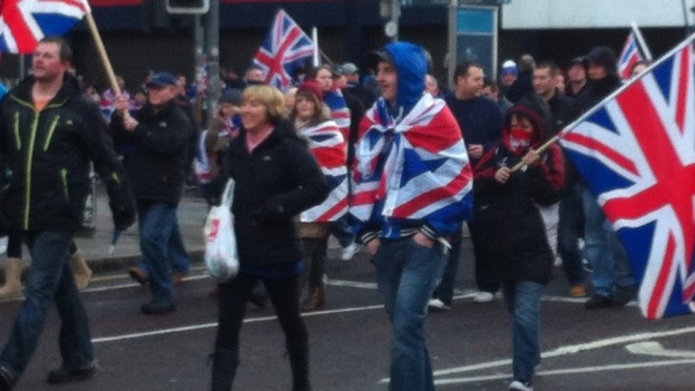 Around a thousand Loyalists march to Belfast City Hall to protest.