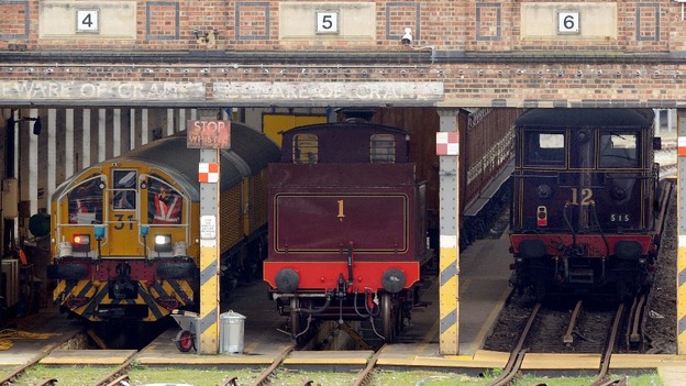 Metropolitan Steam Locomotive Number 1 and electric locomotive Sarah Siddons at an Underground depot near Earl's Court