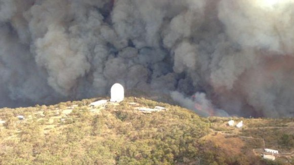 The remote mountaintop facility engulfed in smoke on Sunday.